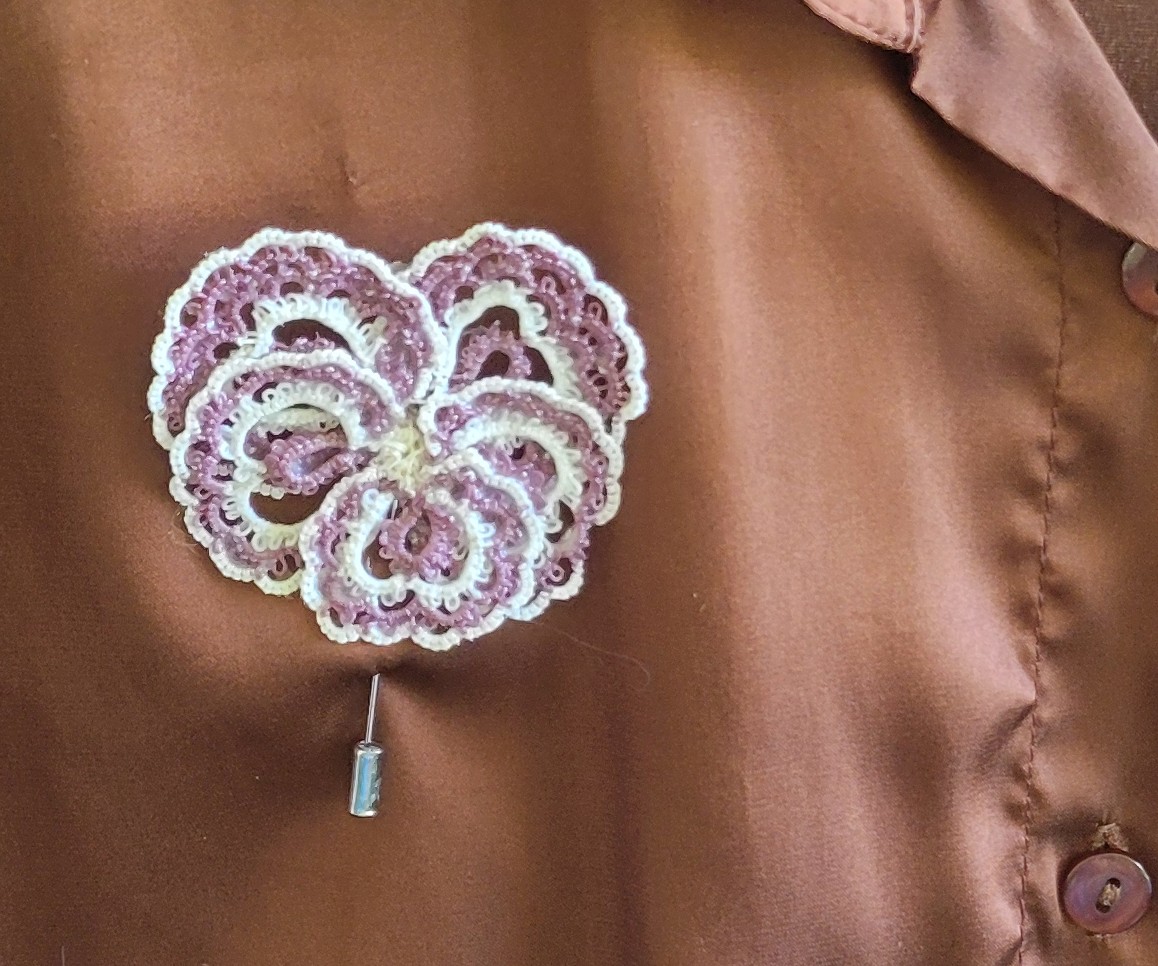 Lavender, purple, cream, and ivory hand-tatted Pansy hat and lapel pin with layered floral lace design